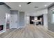 Spacious and modern open-concept living area features kitchen, bathroom, stairs, and sleek finishes at 649 Tranquil Jade St, Las Vegas, NV 89138
