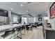 Open-concept kitchen, dining and living room space with modern decor at 649 Tranquil Jade St, Las Vegas, NV 89138