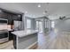 Modern kitchen features stainless steel appliances, island and open floor plan at 649 Tranquil Jade St, Las Vegas, NV 89138