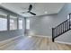 Well-lit living area featuring modern staircase and open floor plan at 649 Tranquil Jade St, Las Vegas, NV 89138