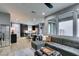 Open concept living space flowing from kitchen featuring modern design at 649 Tranquil Jade St, Las Vegas, NV 89138