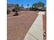 Backyard featuring rock landscaping at 6529 Bradford Ln, Las Vegas, NV 89108