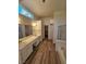 Bathroom with double vanity, separate shower, and ample natural light at 6529 Bradford Ln, Las Vegas, NV 89108