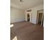 Spacious carpeted bedroom with access to bathroom and ample natural light at 6529 Bradford Ln, Las Vegas, NV 89108