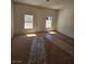 Carpeted bedroom with natural light and windows overlooking the front yard at 6529 Bradford Ln, Las Vegas, NV 89108
