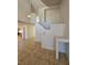 Inviting foyer with tile floors and staircase leading to the upper level at 6529 Bradford Ln, Las Vegas, NV 89108