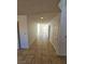 Hallway featuring neutral walls and tile floors at 6529 Bradford Ln, Las Vegas, NV 89108