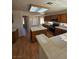 Spacious kitchen with ample counter space, wood cabinets, and tile floors at 6529 Bradford Ln, Las Vegas, NV 89108