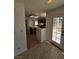 Spacious kitchen with ample counter space, wood cabinets, and tile floors at 6529 Bradford Ln, Las Vegas, NV 89108