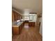 Bright, open kitchen with wooden cabinets, an island, and modern appliances at 6529 Bradford Ln, Las Vegas, NV 89108