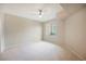 The bedroom includes a ceiling fan and a window for plenty of natural light at 6868 Sky Pointe Dr # 1112, Las Vegas, NV 89131