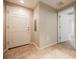 Inviting entryway with neutral color palette and tiled flooring, leading to other rooms at 6868 Sky Pointe Dr # 1112, Las Vegas, NV 89131