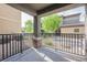 Relax on this covered patio with a view of the community landscaping and nearby buildings at 6868 Sky Pointe Dr # 1112, Las Vegas, NV 89131