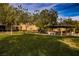 Inviting community playground with covered picnic area, benches, and lush green grass at 6868 Sky Pointe Dr # 1112, Las Vegas, NV 89131