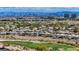 Panoramic aerial view of Summerlin homes, golf course, and the Las Vegas skyline in the background at 701 Peachy Canyon Cir # 201, Las Vegas, NV 89144