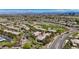 Overhead view of a Summerlin community, golf course, and a winding road, showcasing the landscape at 701 Peachy Canyon Cir # 201, Las Vegas, NV 89144
