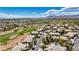Stunning aerial view of a community next to a golf course and residential homes at 701 Peachy Canyon Cir # 201, Las Vegas, NV 89144