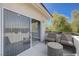 Relax on this virtually staged balcony with seating that gives you a chance to unwind at 701 Peachy Canyon Cir # 201, Las Vegas, NV 89144
