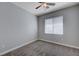Bedroom featuring a neutral color, a window and carpet floors, creating a comfortable private space at 701 Peachy Canyon Cir # 201, Las Vegas, NV 89144