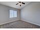 Neutral bedroom with great natural light and a ceiling fan at 701 Peachy Canyon Cir # 201, Las Vegas, NV 89144