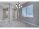 Bright entryway leading to bathroom, with durable flooring and neutral wall paint at 701 Peachy Canyon Cir # 201, Las Vegas, NV 89144