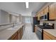 Bright kitchen features modern appliances, ample countertop space, and an open layout at 701 Peachy Canyon Cir # 201, Las Vegas, NV 89144