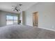 Bright living room features a sliding glass door and a fireplace at 701 Peachy Canyon Cir # 201, Las Vegas, NV 89144