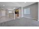 Inviting living room with open access to the kitchen, allowing for seamless entertaining at 701 Peachy Canyon Cir # 201, Las Vegas, NV 89144