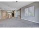 Bright living room boasts an open layout and recessed lighting for a modern feel at 701 Peachy Canyon Cir # 201, Las Vegas, NV 89144