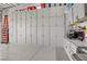 Large garage with wall to wall built in cabinets and epoxy flooring at 709 Corelli Cove St, Henderson, NV 89011