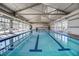 Spacious indoor pool featuring multiple lanes, lots of windows and natural light at 709 Corelli Cove St, Henderson, NV 89011