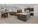 Modern kitchen with an island, sleek countertops, stainless steel appliances, and plenty of space for cooking and entertaining at 709 Corelli Cove St, Henderson, NV 89011