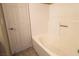 Clean bathroom with a bathtub and neutral-toned walls, ready for relaxation at 7300 Pirates Cove Rd # 2054, Las Vegas, NV 89145