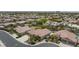 An aerial view of a home with a tile roof and desert landscaping in a residential area at 7719 Villa Montara St, Las Vegas, NV 89123