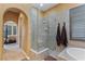 Bathroom showing a glass shower with a bathtub at 7719 Villa Montara St, Las Vegas, NV 89123