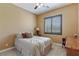 Cozy bedroom features neutral walls, plush carpet, and a window with shutter-style blinds at 7719 Villa Montara St, Las Vegas, NV 89123
