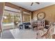 Open concept living room with access to a patio with pool views at 7719 Villa Montara St, Las Vegas, NV 89123