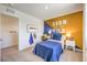 This bedroom has a color blocked accent wall and a fun animal theme at 794 Calm Crystal Ct # Lot 139, North Las Vegas, NV 89081