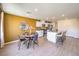 Dining room with modern table set, neutral-toned wall and a view of the kitchen at 794 Calm Crystal Ct # Lot 139, North Las Vegas, NV 89081