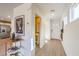Bright hallway with access to the kitchen, front door and a half bath at 794 Calm Crystal Ct # Lot 139, North Las Vegas, NV 89081