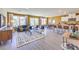 Open-concept living room features modern furniture, neutral color palette and lots of natural light at 794 Calm Crystal Ct # Lot 139, North Las Vegas, NV 89081