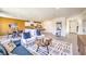 Stylish living room featuring an open layout, bar stool seating and lots of natural light at 794 Calm Crystal Ct # Lot 139, North Las Vegas, NV 89081