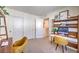 Bright office space with sliding closet doors, modern furniture, and an open floor plan at 794 Calm Crystal Ct # Lot 139, North Las Vegas, NV 89081
