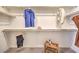 Well-organized walk-in closet with shelving, hanging rods, and space for shoes and accessories at 794 Calm Crystal Ct # Lot 139, North Las Vegas, NV 89081