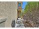 Inviting front entrance with a well-lit walkway and manicured landscaping at 8469 Cheerful Brook Ave, Las Vegas, NV 89143