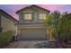 Charming two-story home with a well-manicured yard and a spacious two-car garage at 8469 Cheerful Brook Ave, Las Vegas, NV 89143