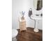 Quaint powder room with a pedestal sink, wood-look flooring, and classic fixtures, perfect for guests at 9303 Gilcrease Ave # 1077, Las Vegas, NV 89149