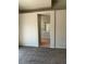 Bedroom with carpeted floor and access to the on-suite bathroom at 951 Country Back Rd, Las Vegas, NV 89123