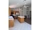 Well-equipped kitchen with stainless steel appliances, a kitchen island, and ample cabinet space at 951 Country Back Rd, Las Vegas, NV 89123