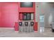 Stylish bar area complete with granite countertops, seating, and display cabinets at 9713 Highridge Dr, Las Vegas, NV 89134